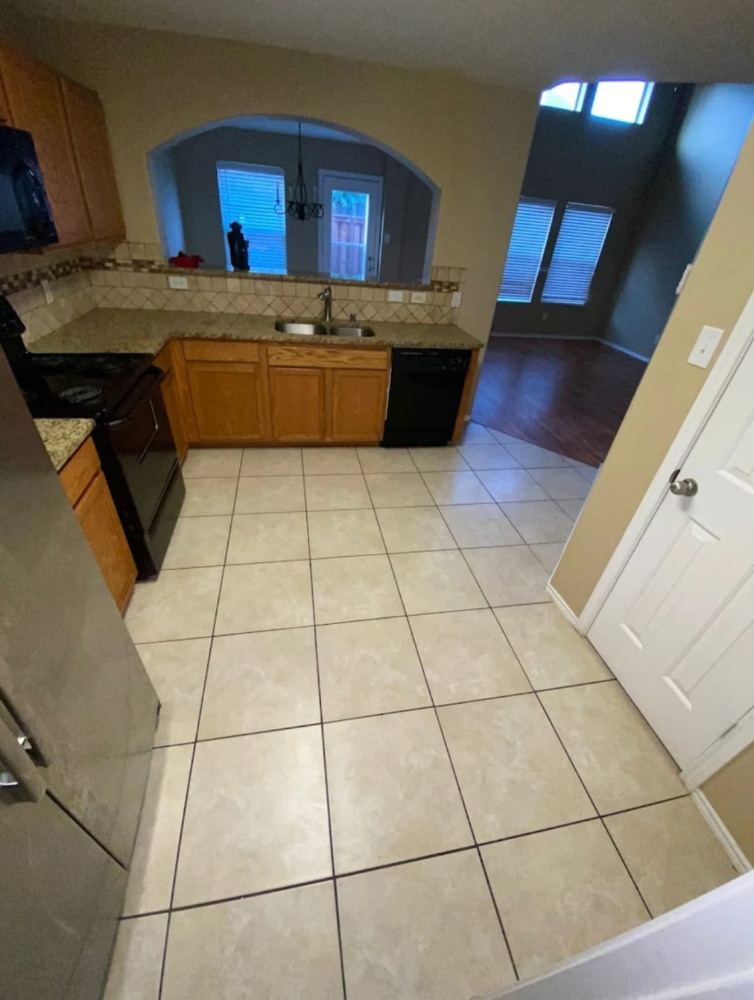 Professional cleaner cleaning window